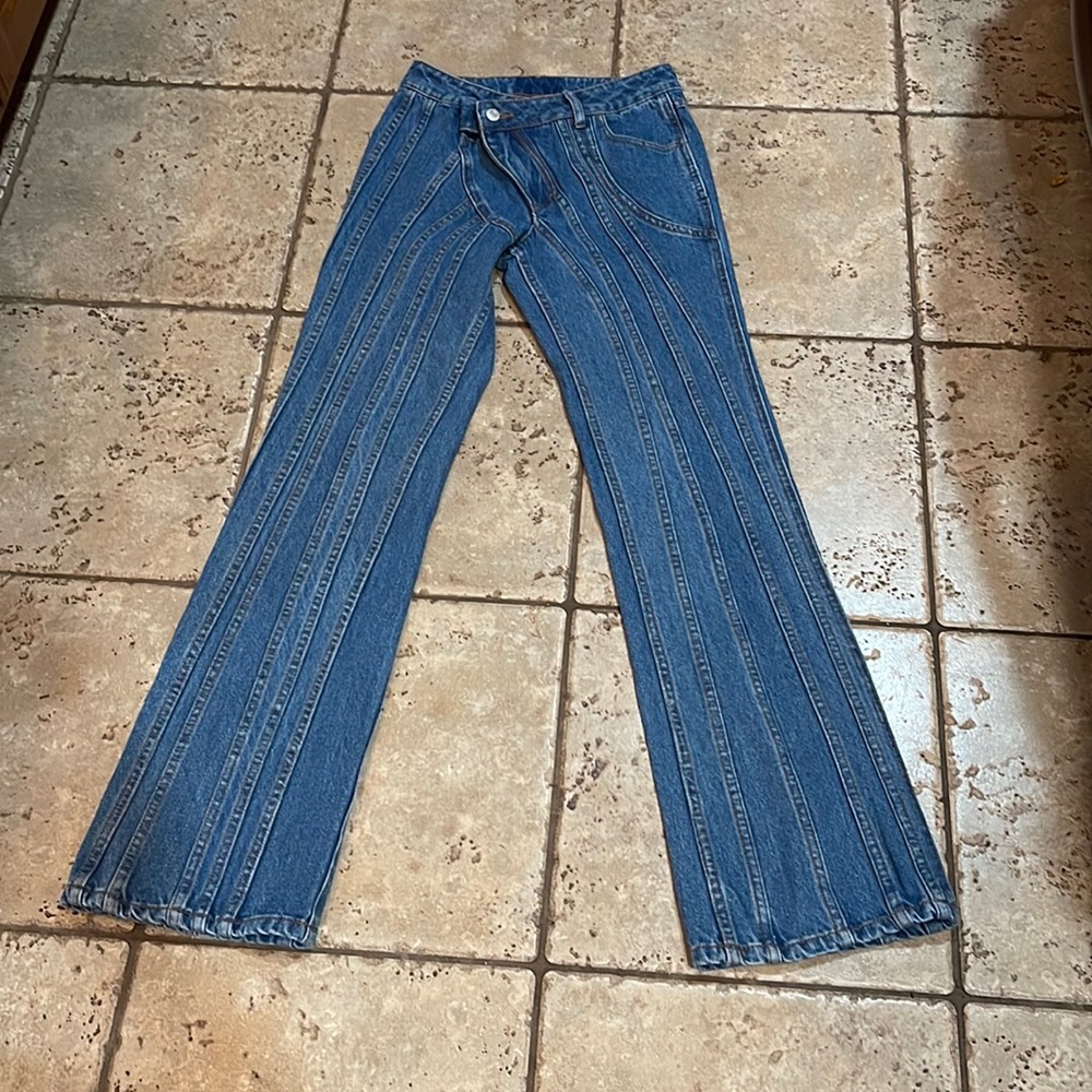 Asymmetrical waist flare jean S. NWOT